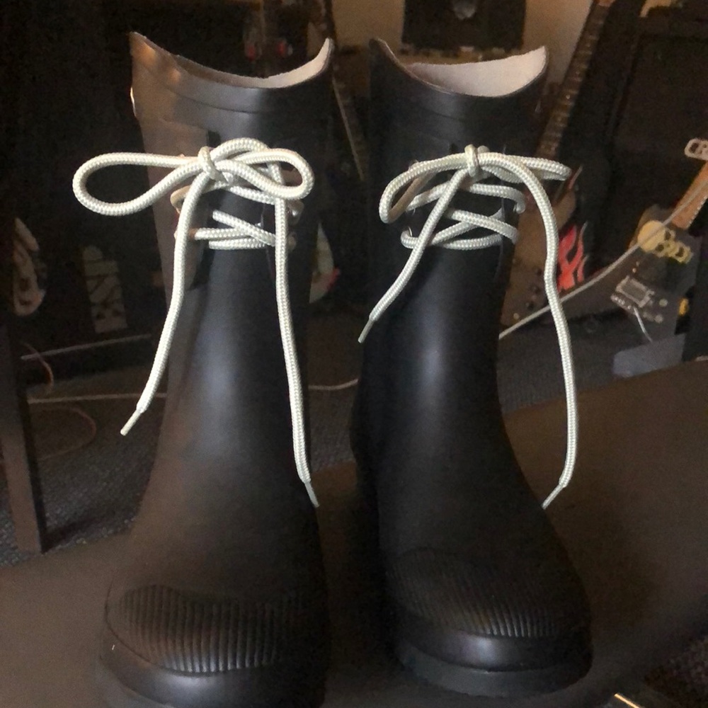 Super cute! Nomad Rain boot black.  Never wore.